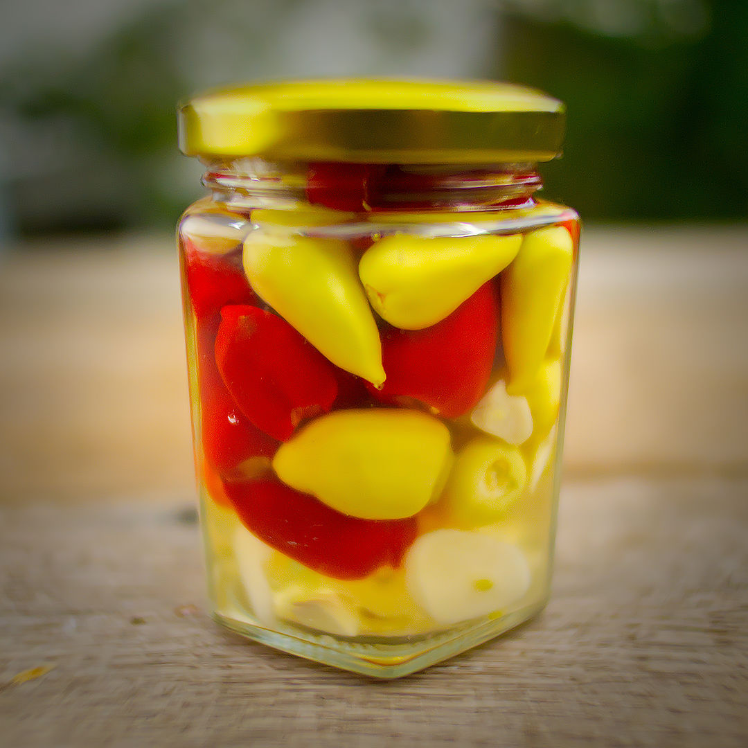 World of Chillies Turkish Pickling chillies in jar with garlic and vinegar