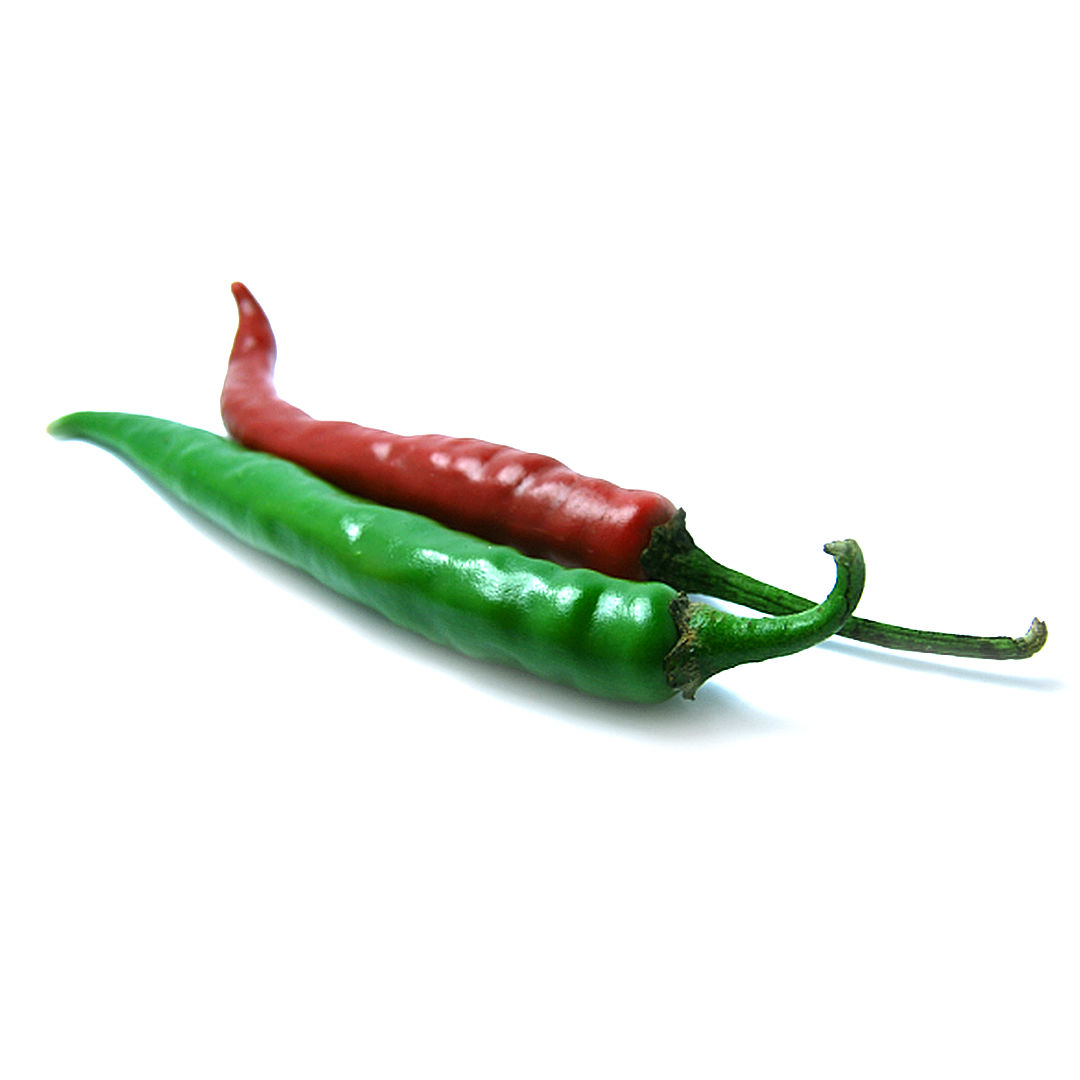 World of Chillies fresh green and red Cayenne chillies on white background