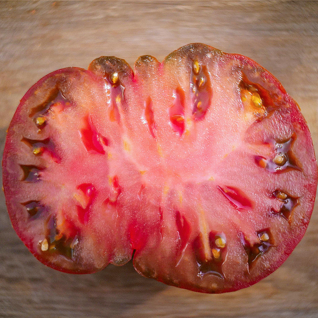 world of chillies purple cherokee tomato sliced lengthways