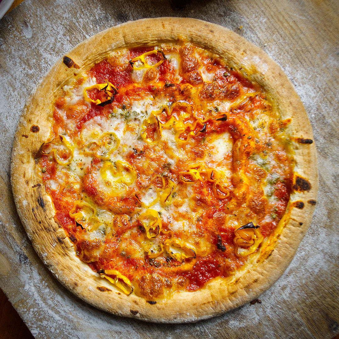 World of Chillies pizza topped with fresh Pepperoncini slices and mozzarella