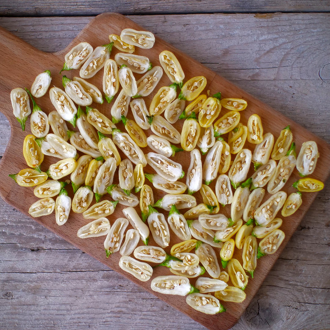 World of Chillies White Habanero cut open on board